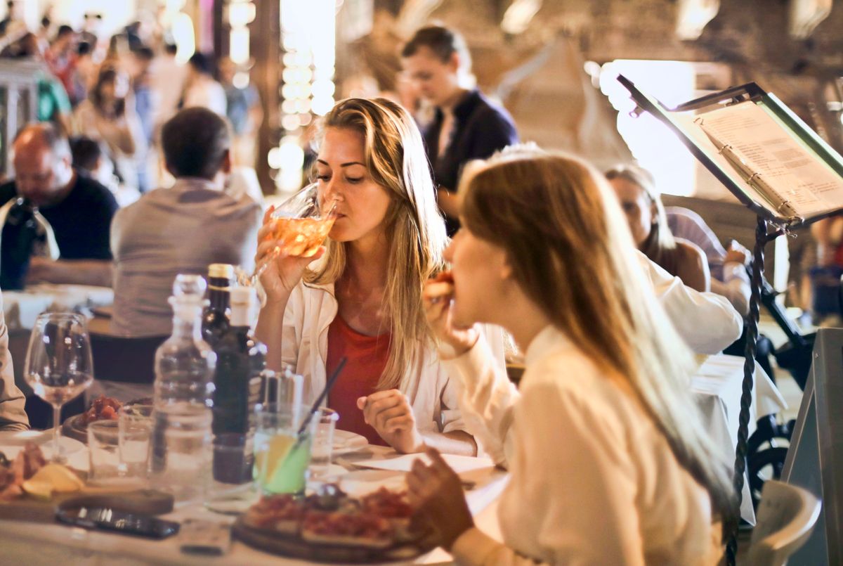 Woman sitting at a café or restaurant table