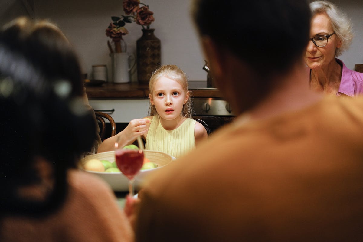 Family sitting together at a table